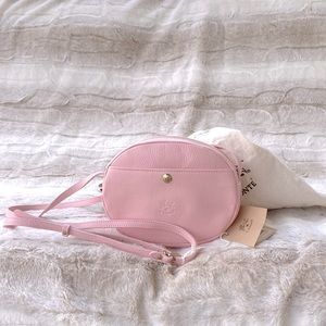 Il Bisonte mini crossbody bag; pink genuine soft leather; made in Italy